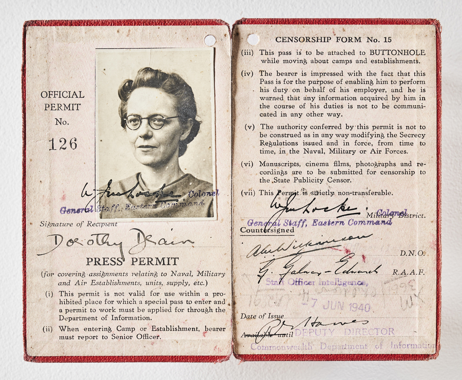 Image 1 of 2 - Press permit for Dorothy Drain that shows a black and white portrait photograph of her