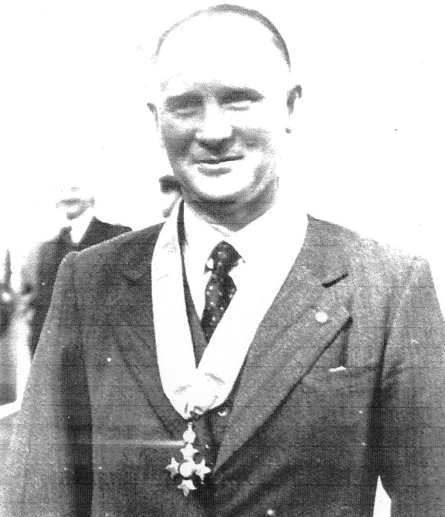 Image 2 of 5 - A formal portrait of Thomas Leech wearing his Commander of the Order of the British Empire award medal. The photograph was taken around 1940.