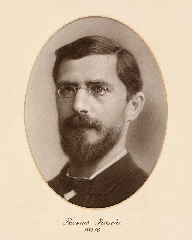 Image 2 of 6 - Black and white portrait of Dr Thomas Fiaschi wearing a suit and bowtie. Text at the bottom says ‘Thomas Fiaschi. 1889-90.'