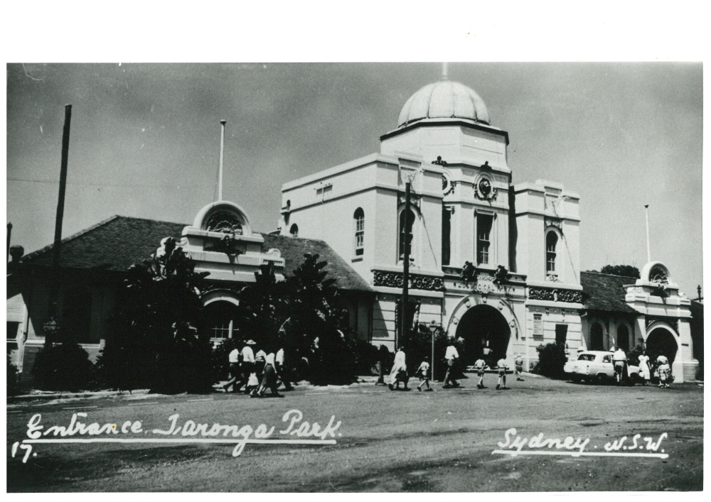 Image 4 of 5 - Black and White image of the front of a building. Text on the image reads ‘Entrance Taronga Park.’ ‘Sydney. N.S.W.’